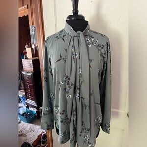 Women’s long sleeve blouse size is medium Ann Taylor is the brand